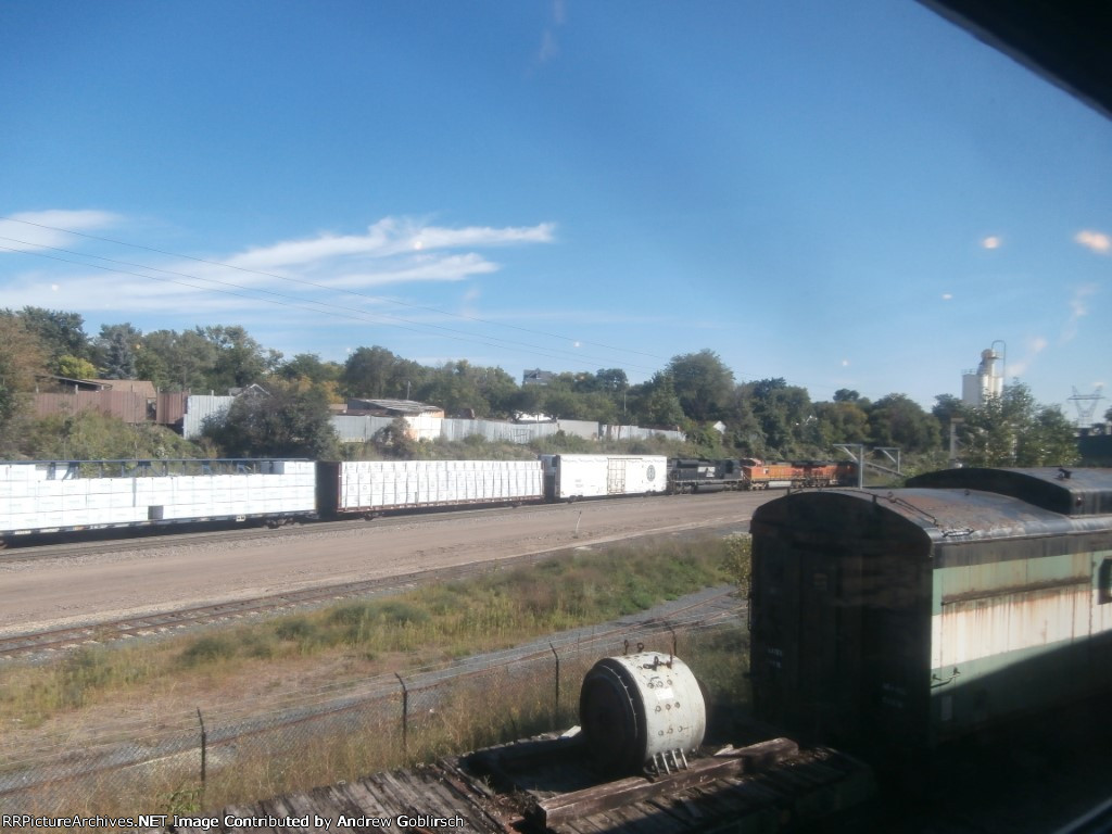 2 BNSF Units, a NS Unit, NP 61248 + MNTX 16